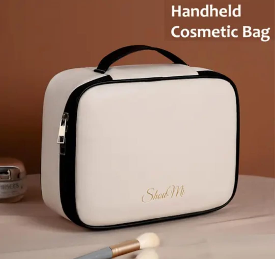 make up kit 2 Elegant beige ShawMi travel makeup organizer bag with top handle, spacious storage, and zip closure for cosmetics and skincare essentials.